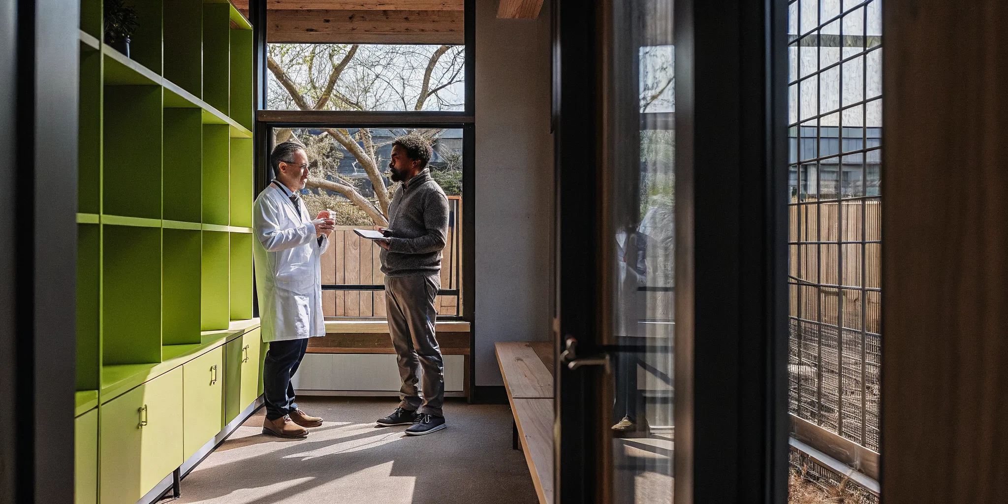 Man discussing testosterone therapy Tampa questions with a clinical provider
