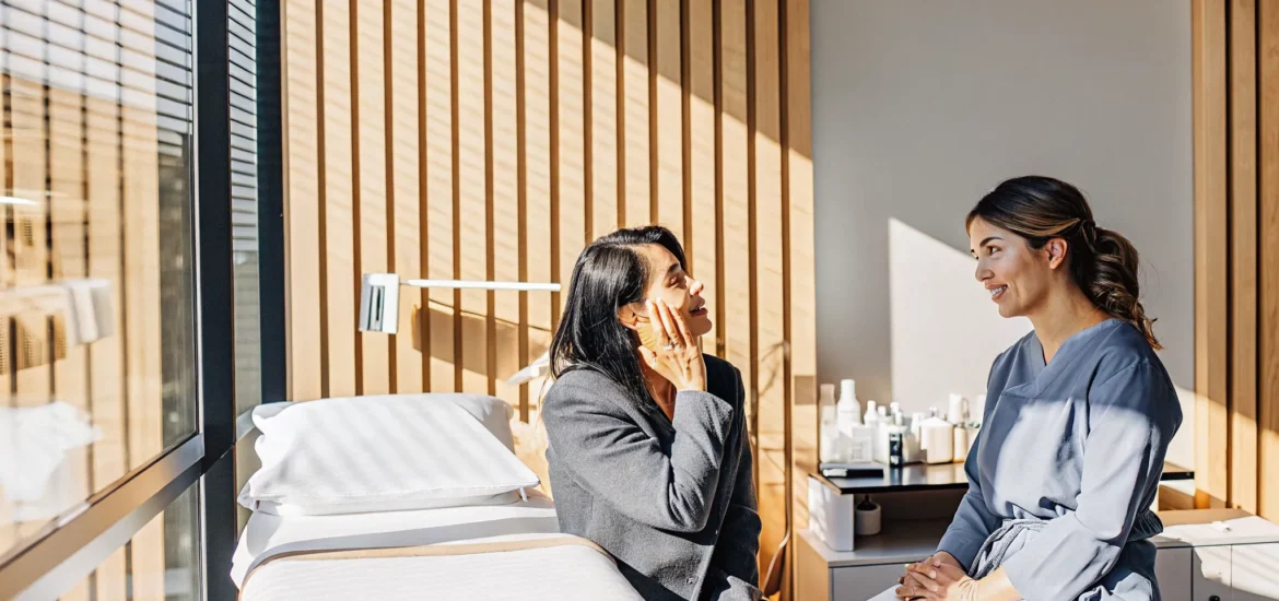 Patient discussing chemical peels Tampa treatment options with a clinical provider