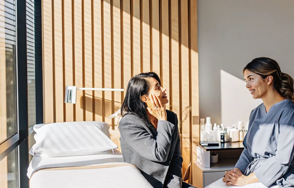 chemical-peels-tampa-consultation-guide Patient discussing chemical peels Tampa treatment options with a clinical provider
