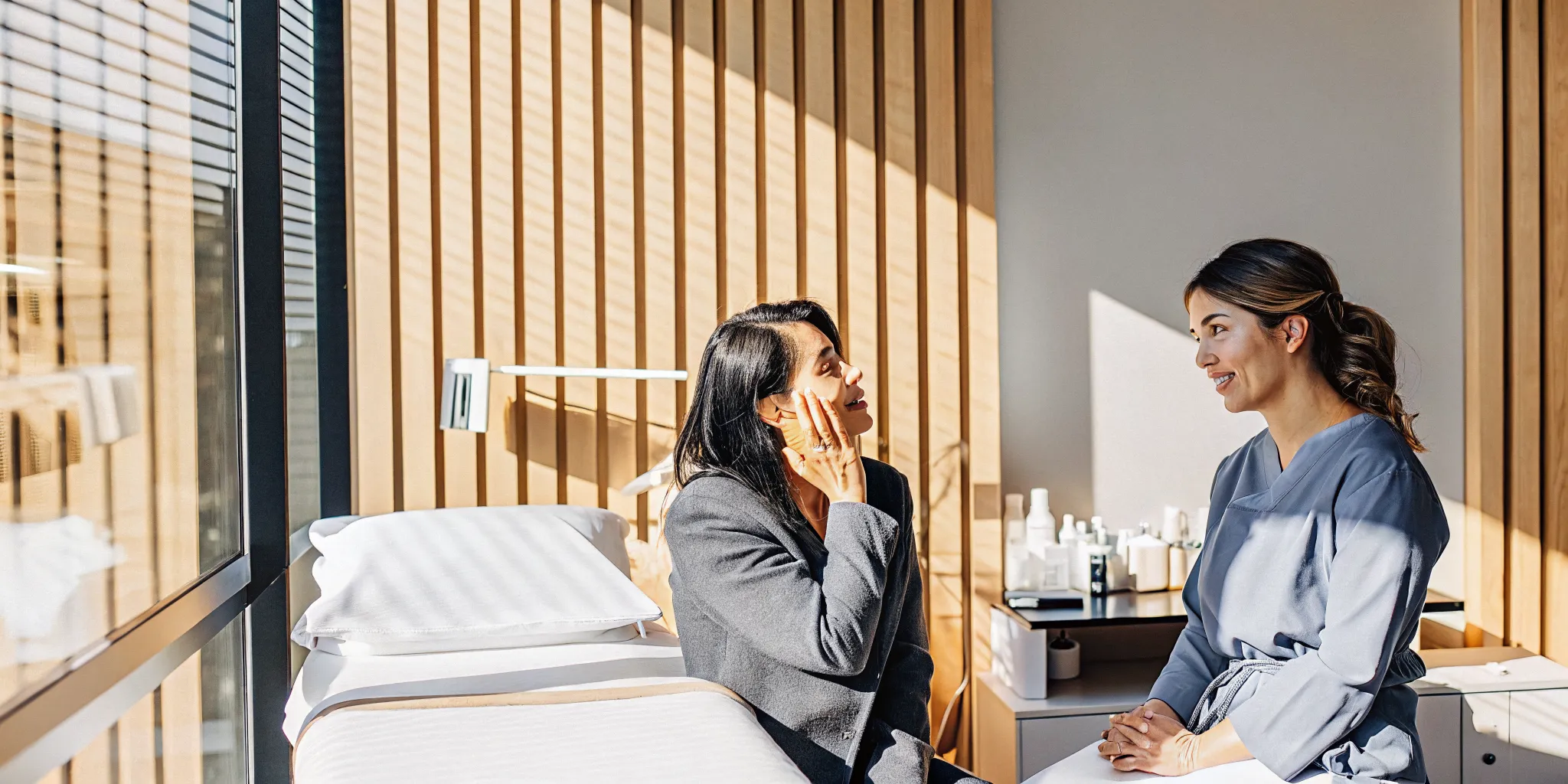 Patient discussing chemical peels Tampa treatment options with a clinical provider