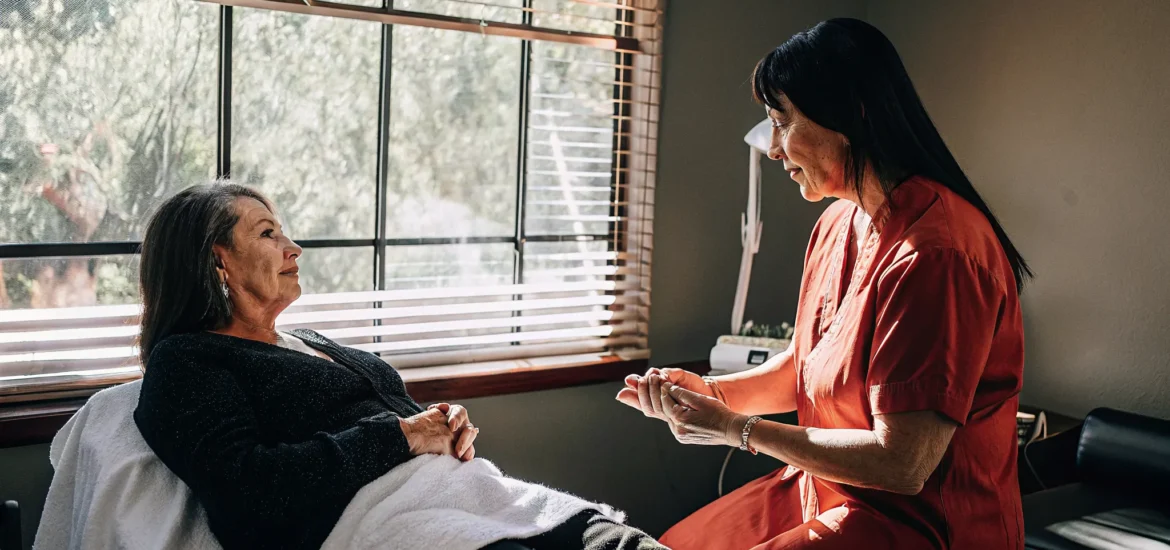 Patient discussing a DiamondGlow facial consultation with an aesthetic provider in Tampa