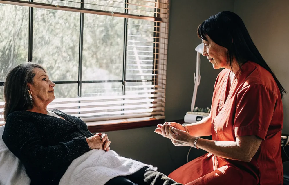 diamondglow-facial-tampa-consultation-guide Patient discussing a DiamondGlow facial consultation with an aesthetic provider in Tampa