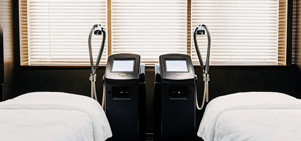 Medical spa treatment room with advanced laser body contouring equipment in a modern Tampa clinic